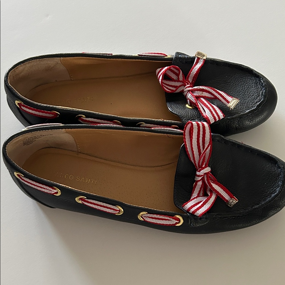Blue loafers with ribbon eyelet stitching